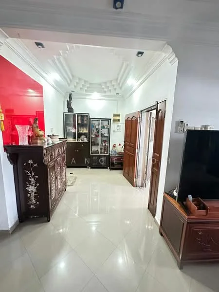 Room features: white painted walls, red accent wall, tray ceiling, recessed downlights, glossy tile flooring, wooden console cabinet, glass display cabinet, wooden TV cabinet, decorative items on console, doorway to another room; style: modern.