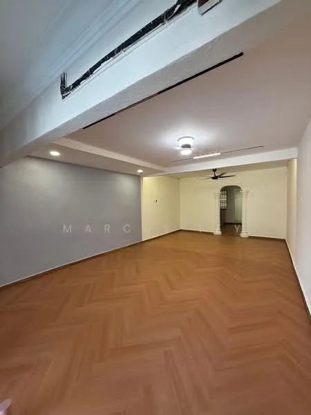 Room features: light wood herringbone flooring, white painted walls, grey accent wall, recessed downlights, ceiling fan, archway leading to another room, no visible furniture, open layout; style: modern.