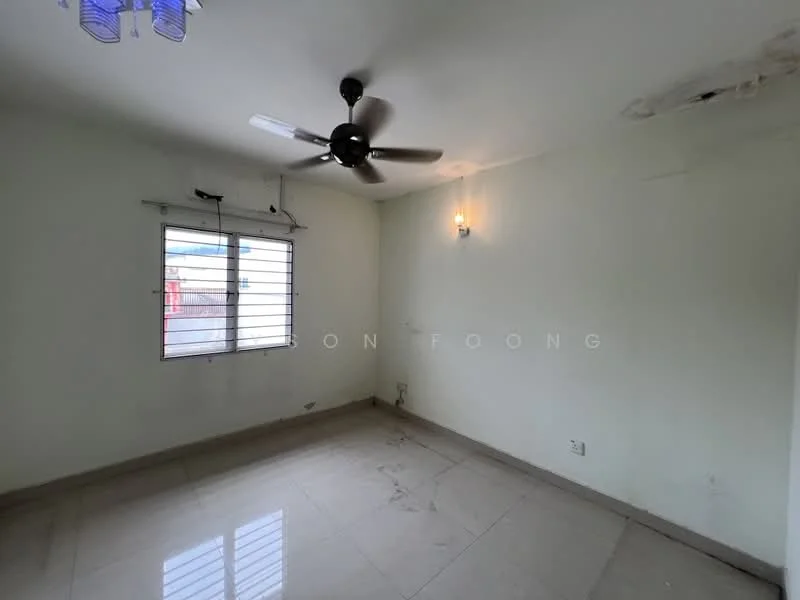 Room features: white painted walls, marble tile flooring, ceiling fan, single light fixture on wall, window with horizontal bars, no visible furniture, neutral color scheme, corner of room with ceiling damage; style: minimalist.