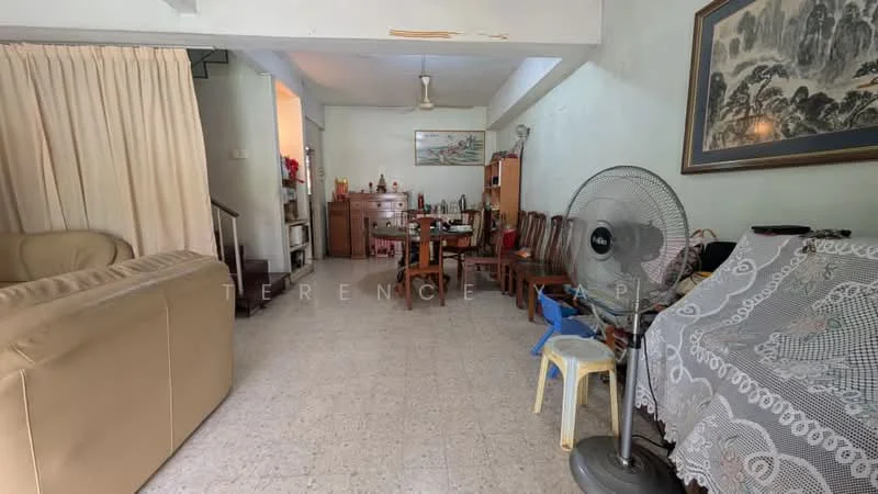 Living features: cream painted walls, tile flooring, ceiling fan, 3-seater fabric sofa in beige, wooden dining table with chairs, decorative wall art, sideboard cabinet, area rug, folding chair, table with lace cover; style: traditional.