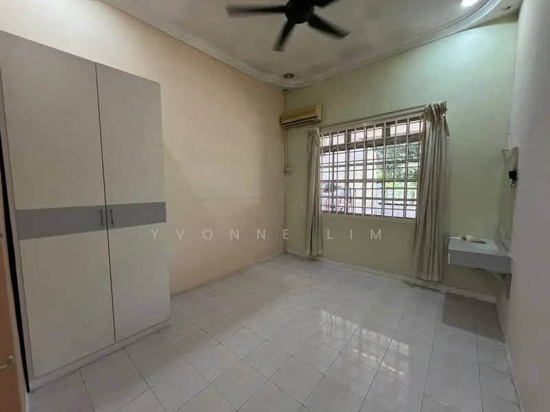 Room features: white painted walls, cream accent wall, white tiled flooring, ceiling fan, window with grid pattern, curtains, built-in wardrobe with grey and white finish, air conditioning unit, sink with countertop; view: garden.