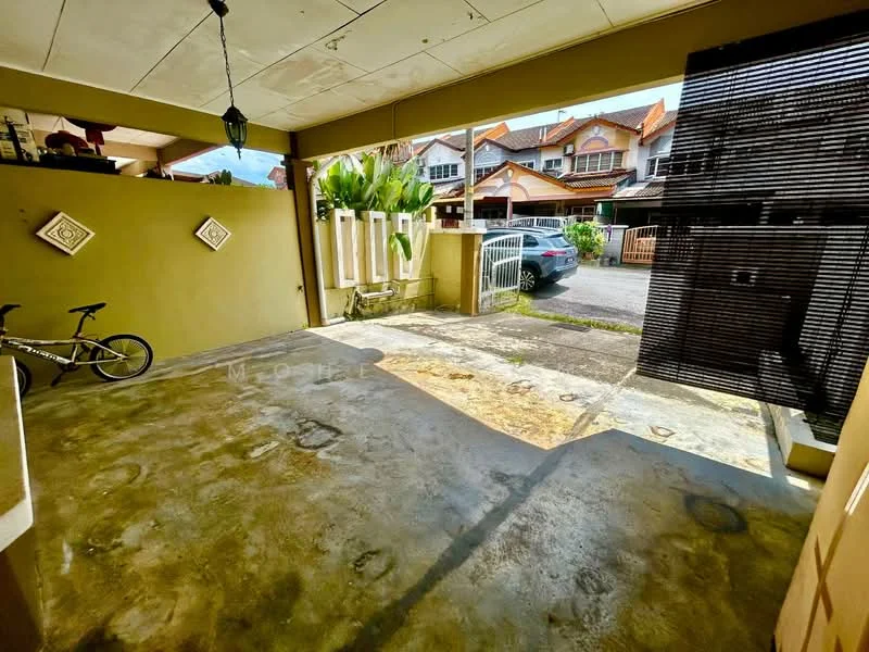 Exterior type: linked terrace house; features: concrete flooring, open car porch, decorative wall panels, manicured plants, security gate, surrounding residential area, driveway, partially covered area; style: modern.