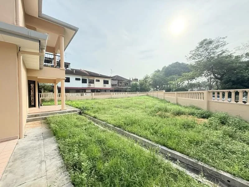 Exterior type: detached bungalow; features: manicured lawn, surrounding greenery, fenced perimeter wall, paved walkway, single-storey structure, sunlight exposure, open space, adjacent residential buildings; style: modern.