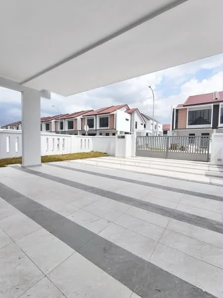 Exterior type: linked terrace house; features: white painted facade, flat roof, manicured lawn, stone-paved walkway, fenced perimeter, driveway with interlocking pavers, surrounded by residential buildings; style: modern.