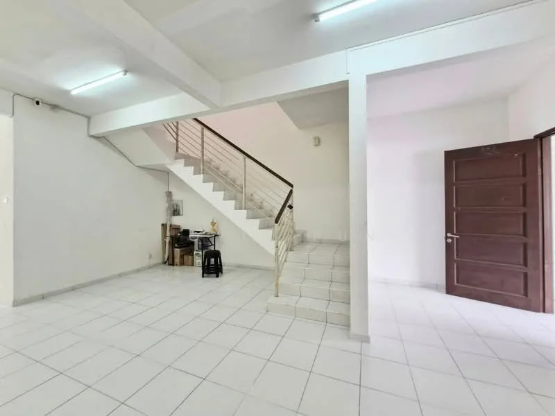 Room features: white painted walls, white tiled flooring, staircase with metal railing, door with wooden finish, ceiling lights, open space layout, corner for dining or kitchen area, large windows for natural light; style: modern.