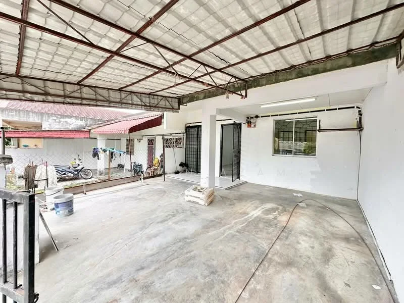 Exterior features: concrete flooring, metal roof with skylights, white painted walls, open space layout, security grille at entrance, large windows, exposed beams, outdoor area with potential for landscaping; style: modern.