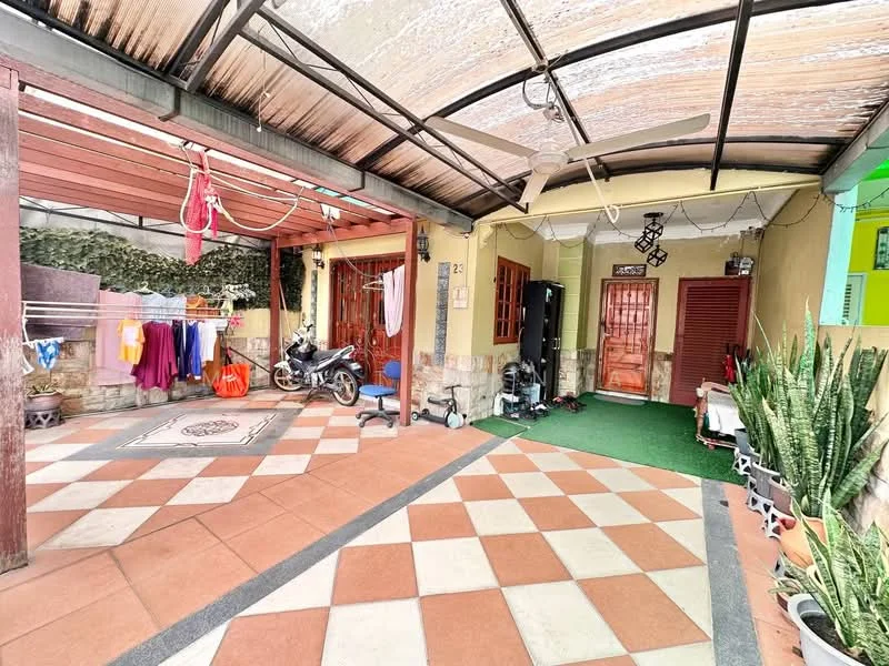 Exterior type: linked terrace house; features: covered car porch, checkerboard tiled flooring, green grass area, wooden door, decorative wall with plants, clothes drying area with clothesline, motorcycle parked, outdoor lighting, wall-mounted intercom, fenced perimeter; style: modern.