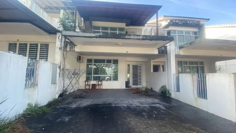 Exterior type: semi-detached house; features: white painted facade, flat roof, two-storey structure, concrete driveway, manicured lawn, fenced yard, outdoor seating area with two chairs, sliding glass door, multiple windows, exterior wall with visible wear, balcony on upper level; style: modern.