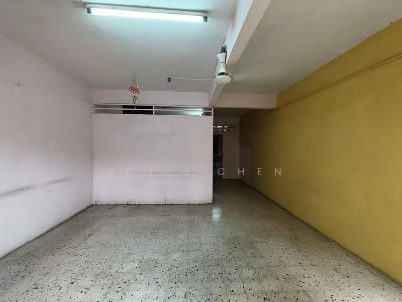 Room features: white painted walls, yellow painted wall, polished concrete flooring, fluorescent ceiling lights, ceiling fan.