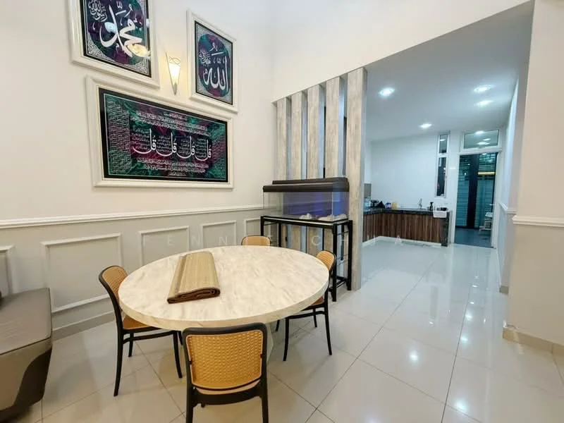 Dining features: round marble dining table, 4 rattan dining chairs, decorative wall art with Arabic calligraphy, white painted walls, recessed lighting, tile flooring, wall-mounted aquarium, open layout to kitchen; style: modern. Kitchen features: wood cabinetry, countertop with bar seating, kitchen appliances visible, tile flooring, open layout to dining area; style: modern.