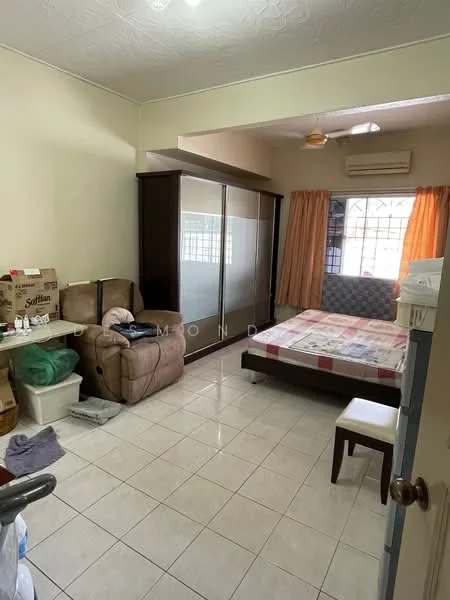 Bedroom features: tiled flooring, cream painted walls, window with sheer curtains, ceiling fan, double bed with mattress, upholstered headboard, built-in wardrobe with sliding doors, armchair, small wooden stool, cardboard boxes, plastic storage bin.