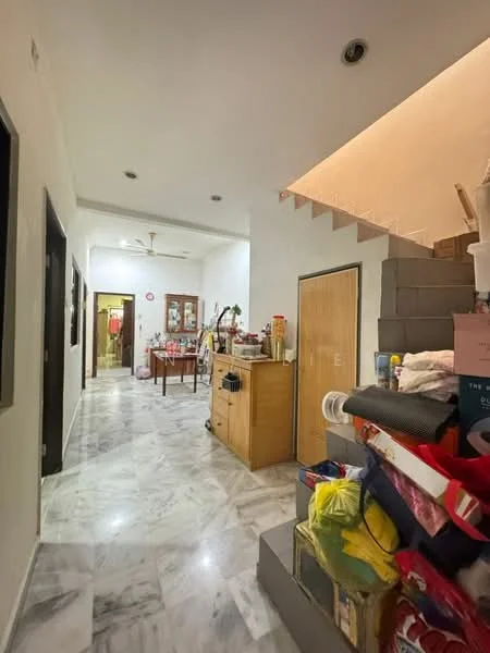 Room features: white painted walls, marble flooring, staircase with grey steps, ceiling fan, wooden cabinet, dining table, decorative items on table, storage boxes, open space layout; style: modern.
