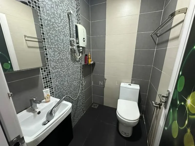 Bathroom features: grey tiled walls, black tiled flooring, single-sink vanity with black cabinet, chrome basin mixer faucet, one-piece toilet, shower with handheld showerhead, wall-mounted water heater, mirror above sink, towel rack, shelf for toiletries; style: modern.