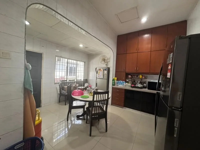 Kitchen features: white tiled walls, glossy ceramic tile flooring, brown wooden cabinetry, stainless-steel refrigerator, built-in oven, black countertop, round dining table, 4 dining chairs, ceiling fan, window with grid pattern, sink, kettle, various kitchen utensils on countertop; style: modern.