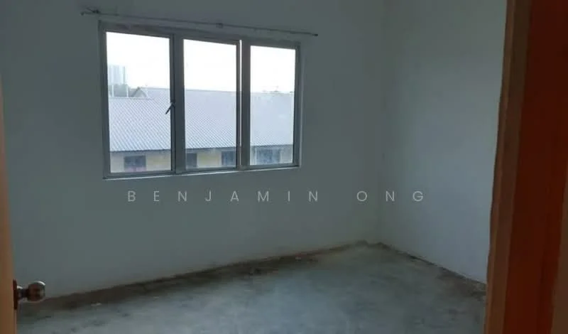 Room features: plain white walls, concrete flooring, single window, no visible furnishings, neutral color scheme, unadorned ceiling, no visible lighting fixtures, no built-in storage; style: minimalist.