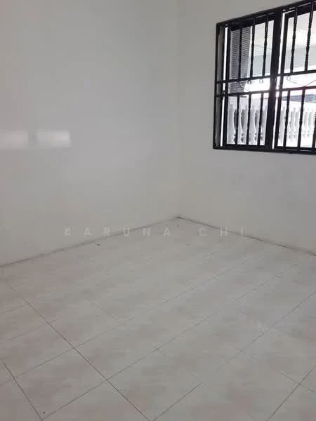 Room features: white painted walls, tile flooring, black metal window bars, single window.