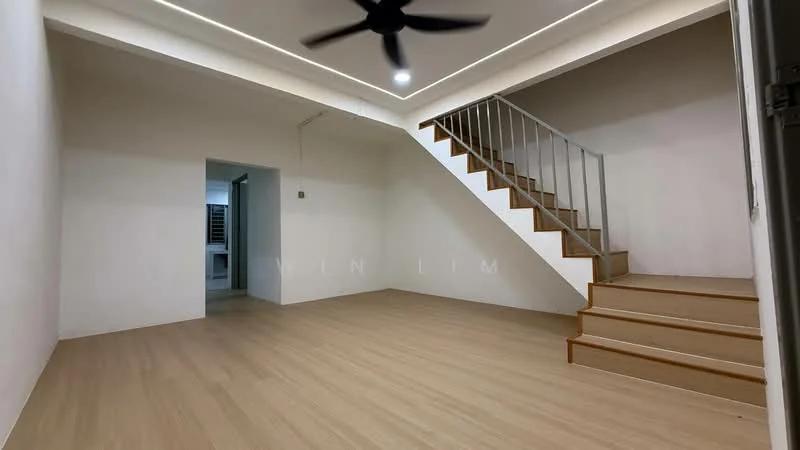 Living features: light wood laminate flooring, white painted walls, 5-blade ceiling fan, recessed LED downlights, staircase with wooden steps and metal railing, open layout, large wall space for furniture placement, no visible window treatments; style: modern. Room features: white painted walls, light wood laminate flooring, doorway leading to another room.