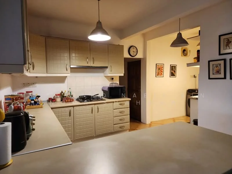 Kitchen features: cream cabinetry with grid pattern, light-colored countertop, stainless-steel gas stove, exhaust hood, double-basin sink, chrome faucet, wall-mounted clock, pendant lighting, tile backsplash, floor tiles, open shelving, framed artwork on walls; style: traditional.
