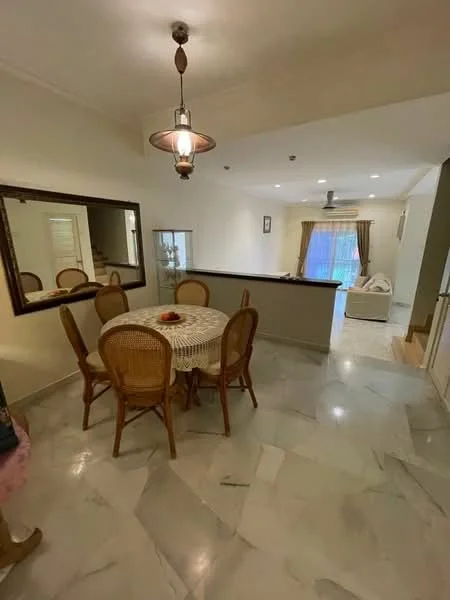 Dining features: round dining table, 6 rattan dining chairs, marble flooring, cream painted walls, pendant light fixture, large mirror on wall, window with sheer curtains, recessed downlights; style: contemporary. Living features: sofa visible in background, light-colored curtains, natural light from window; style: contemporary.