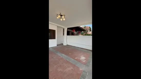 Room features: white painted walls, ceiling with chandelier, tile flooring, outdoor patio area, covered area, light fixture, open space, access to garden or outdoor area; style: modern; view: garden.