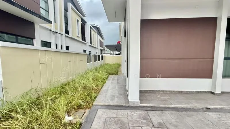 Exterior type: linked terrace house; features: grey stone-paved walkway, manicured grass area, cream painted facade, brown accent wall, two-storey building, surrounded by low fencing, modern architectural design; style: modern.