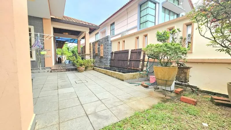 Exterior type: detached bungalow; features: paved outdoor patio, landscaped garden area, stone wall feature, wooden fence, planters with greenery, water feature or pond, covered walkway, adjacent residential buildings; style: modern.