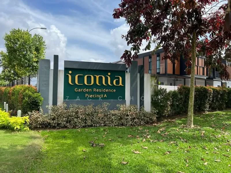 Exterior features: landscaped garden, signage with name 'iconia', green grass, hedge plants, trees, modern architectural elements; style: modern.