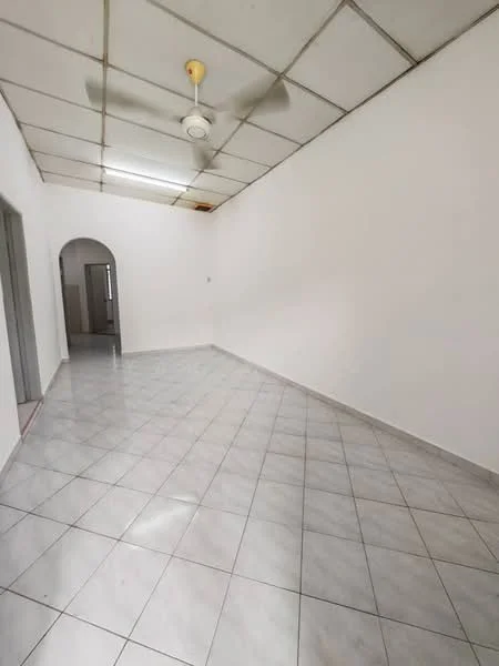 Room features: white painted walls, glossy ceramic tile flooring, ceiling fan, arched doorway, neutral color scheme, no visible furniture, natural light from doorway, plain ceiling with tiles; style: minimalist.