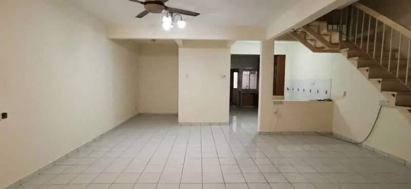 Living features: cream painted walls, white tiled flooring, 5-blade ceiling fan with light, open layout, staircase leading to upper floor, large windows for natural light, neutral color scheme, no visible furniture; style: modern. Kitchen features: kitchen counter with backsplash, white cabinetry, no visible appliances, open to living area; style: modern.