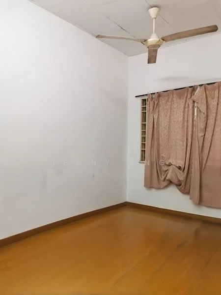 Room features: white painted walls, wooden flooring, ceiling fan with wooden blades, window with brown curtains.