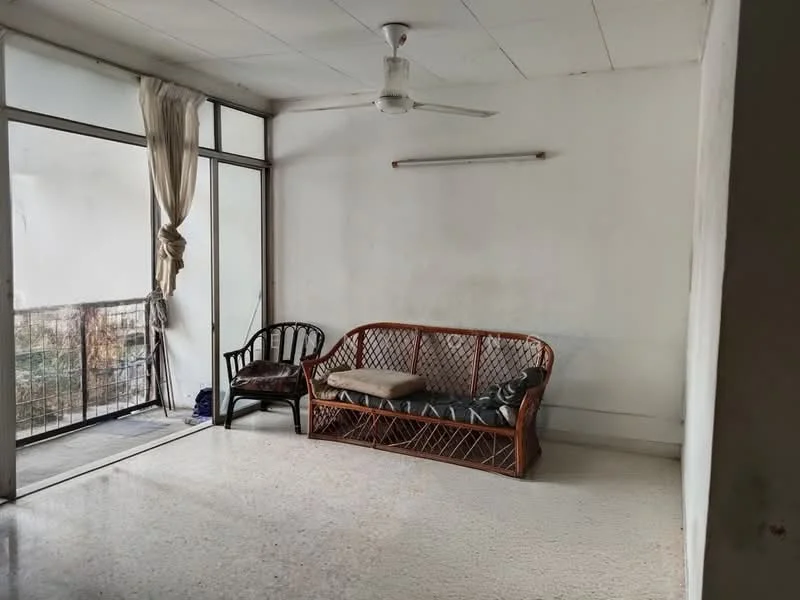 Living features: white painted walls, polished concrete flooring, 5-blade ceiling fan, large sliding glass door, curtains, rattan sofa, wooden chair, natural light from window; style: minimalist; view: garden.