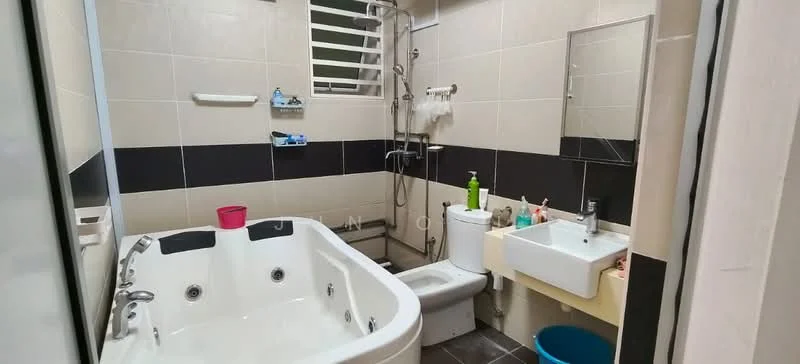 Bathroom features: jacuzzi tub, white ceramic toilet, single-sink vanity with wood cabinet, mirror above sink, shower with handheld showerhead, black and beige tile walls, dark tile flooring, window for natural light, toiletries on vanity, soap dispenser, cleaning products, towel rack; style: modern.