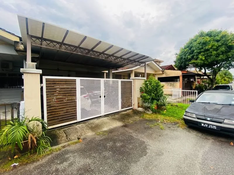 Exterior type: linked terrace house; features: white painted facade, wooden slatted gate, car porch with awning, manicured lawn, mature trees, paved driveway, surrounded by greenery; style: modern.