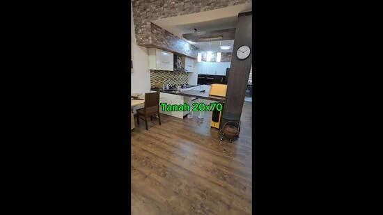 Kitchen features: laminate flooring, wooden cabinetry, white countertop, stainless-steel sink, chrome pull-down faucet, tile backsplash with geometric pattern, built-in oven, freestanding range oven, recessed downlights, pendant light, dining table with chairs, wall clock, open shelving, kitchen island; style: modern.