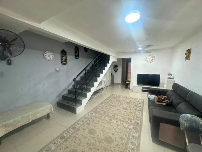 Living features: 3-seater fabric sofa in dark grey, coffee table, wall-mounted TV, entertainment unit, area rug with intricate pattern, ceiling fan with light, wall clock, decorative wall mirrors, staircase with black railing, white painted walls, tile flooring; style: modern.