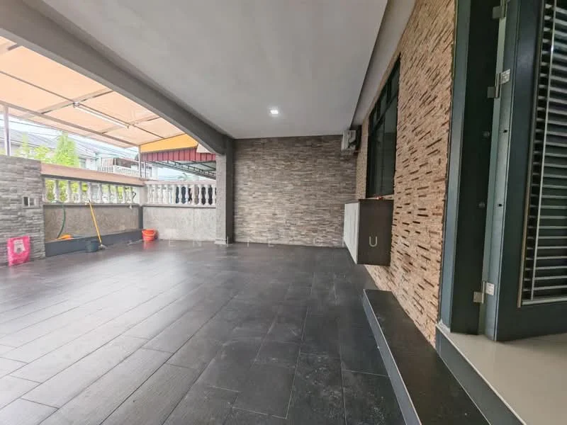 Room features: stone accent wall, grey tiled flooring, covered patio area, outdoor seating space, sliding glass door, ceiling light, open space, sweeping view of surroundings; style: modern; view: garden.
