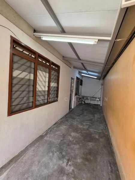 Room features: concrete flooring, white painted walls, orange accent wall, wooden window frames, glass window panes, fluorescent ceiling lights, exposed ceiling beams, narrow corridor layout.