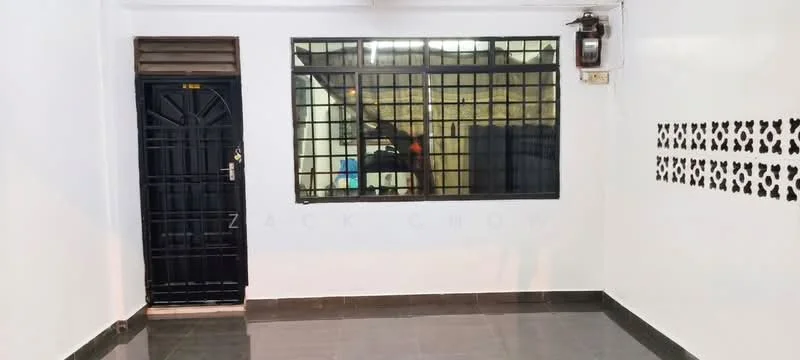 Room features: black front door, large window with grid pattern, white painted walls, black tiled flooring, visible electrical meter, decorative wall with butterfly patterns, neutral lighting, open layout; style: modern.