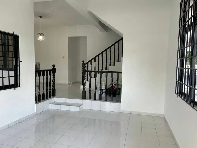 Living features: white painted walls, glossy white tile flooring, staircase with wooden railing, pendant light fixture, large windows with black metal grills, open layout, ceiling with no visible texture, corner fan; style: modern.
