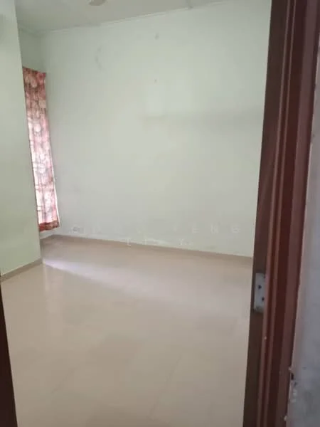 Room features: light green painted walls, cream tiled flooring, curtains with floral pattern, single window, no visible furniture, empty space.