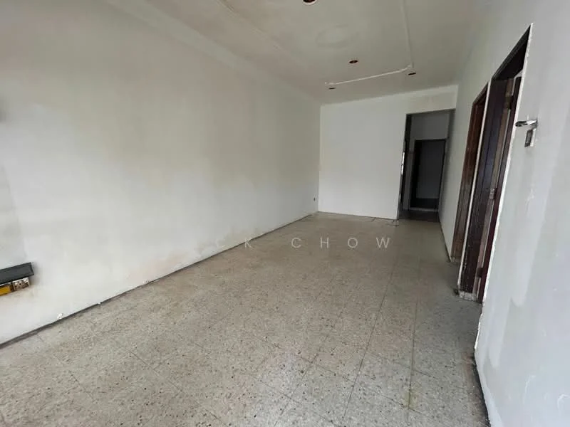 Room features: white painted walls, grey tiled flooring, ceiling with recessed lights, doorway leading to another room, no visible furniture or decor.