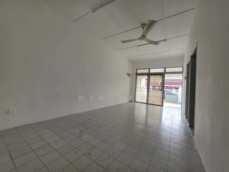 Room features: white painted walls, tiled flooring, ceiling fan, large glass sliding doors, natural light from windows, open layout, no visible furniture, plain ceiling; style: minimalist.