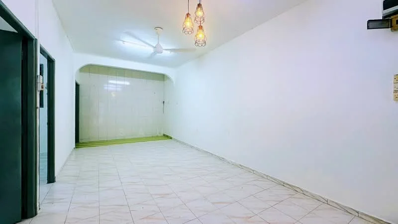 Room features: white painted walls, tile flooring, ceiling fan with light, three pendant lights, arched doorway, green accent wall, empty space; style: minimalist.