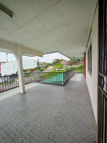 Room features: covered balcony, grey tiled flooring, metal railing, overhead roof, view of surrounding area, partial view of swimming pool, decorative privacy screen, open space; view: garden.