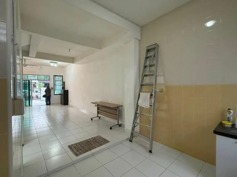 Room features: white painted walls, yellow tiled wall, white tile flooring, exposed ceiling beams, sliding glass door, window with metal grille, wooden table, step ladder, doormat; style: minimalist.
