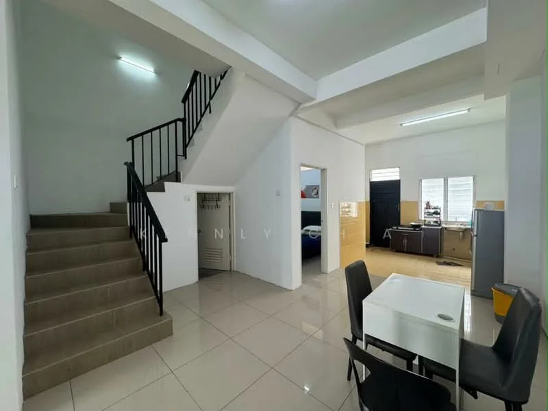 Living features: white painted walls, glossy tile flooring, staircase with black railing, recessed ceiling lights, dining table with four black chairs, open layout, large windows, kitchen area visible in background; style: modern. Room features: staircase with beige steps, storage area under stairs, doorway leading to another room.
