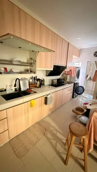 Kitchen features: light wood cabinetry, black countertop, single-bowl stainless-steel sink, chrome pull-down faucet, built-in oven, freestanding washing machine, dish rack, kitchen towel, stool, tile flooring, wall-mounted shelves, kitchen utensils, window with sheer curtains; style: modern.