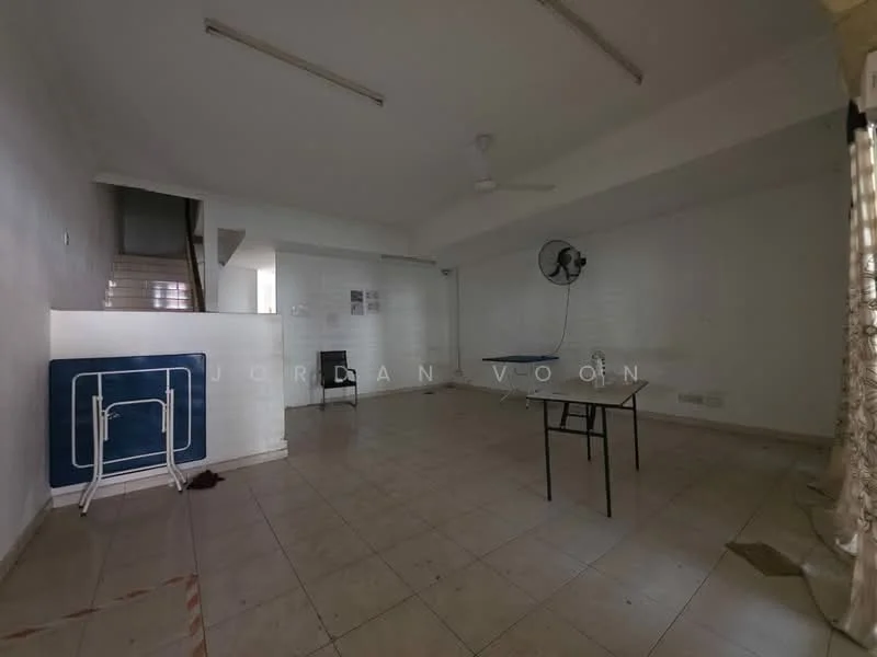 Room features: white painted walls, tile flooring, ceiling fan, large windows, staircase visible, table, folding chair, wall-mounted fan; style: minimalist.