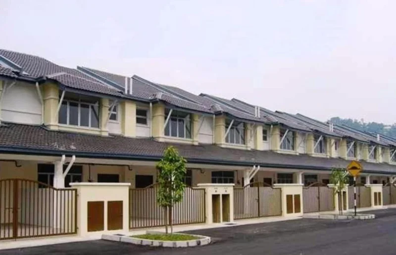 Exterior type: linked terrace house; features: two-storey building, pitched tile roof, cream painted facade, balconies on upper floor, metal railings, manicured landscaping, driveway with interlocking pavers, gated entry, solar panels on roof, street view with road access; style: modern.