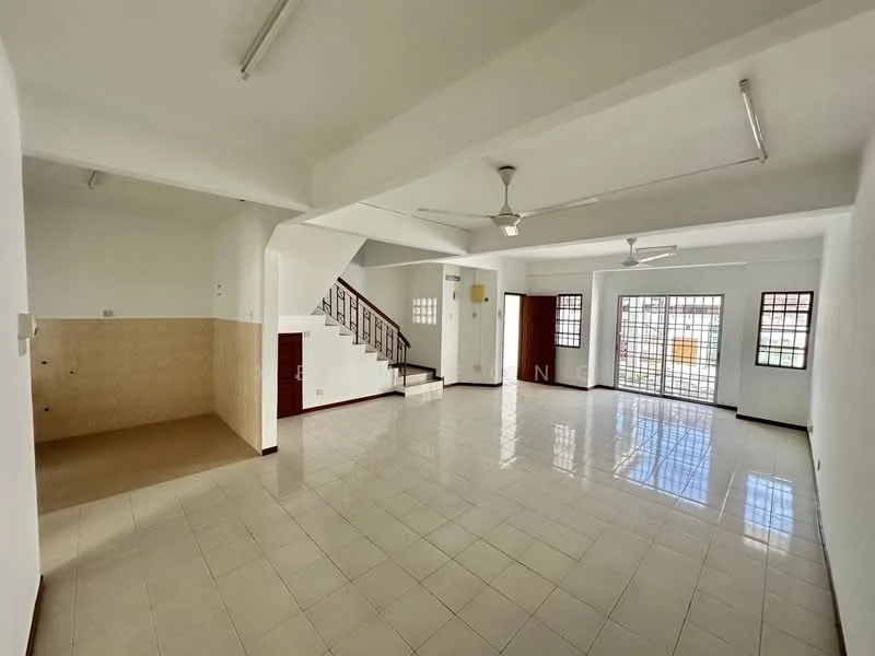 Living features: white painted walls, glossy ceramic tile flooring, 5-blade ceiling fan with light, large windows with grilles, open layout, staircase leading to upper floor, natural light from windows, neutral color scheme; style: modern. Kitchen features: tile backsplash, laminate countertop, kitchen cabinetry, space for appliances, open layout to living area; style: modern.